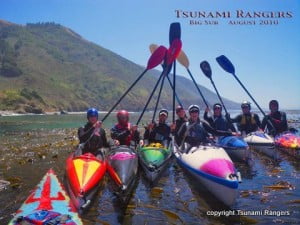 Tsunami Rangers do the obligatory paddle salute Tsunami Rangers do the obligatory paddle salute