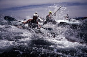The Tsunami Rangers mix it up on the reef at Pillar Point. Eric Soares is in the foreground.
