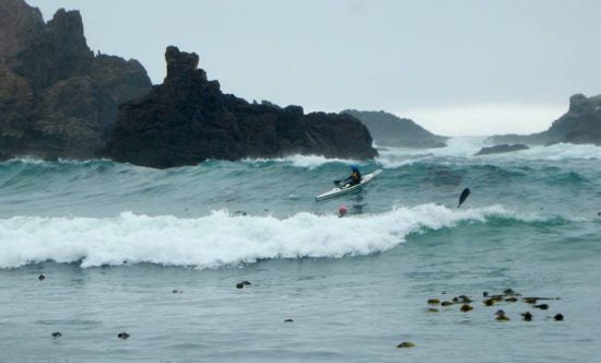 TR Scott Becklund surfing at the take-out