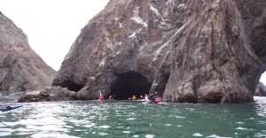 Paddling into the throat of the cave